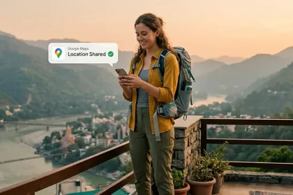 A young solo traveler safely sharing her live location during a golden hour sunset in Rishikesh, India.